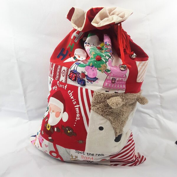 A custom Christmas sack made from many fabrics and clothes