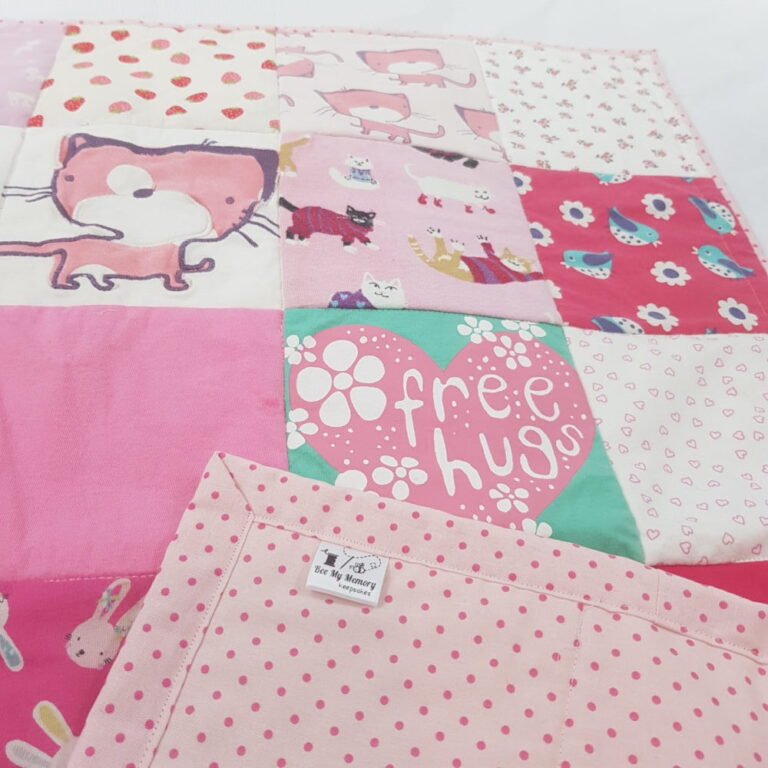 Pink patchwork memory blanket