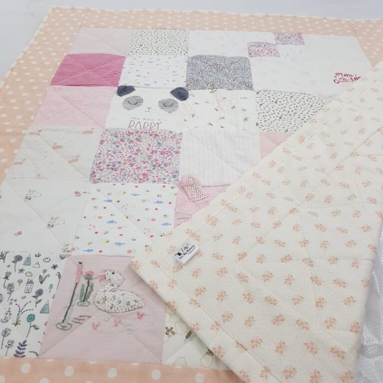A baby girl's patchwork memory blanket