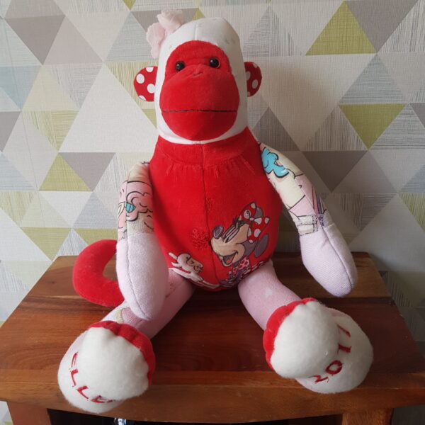 A red keepsake memory monkey