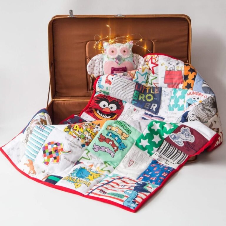 Handmade baby memory blanket made from outgrown baby clothes