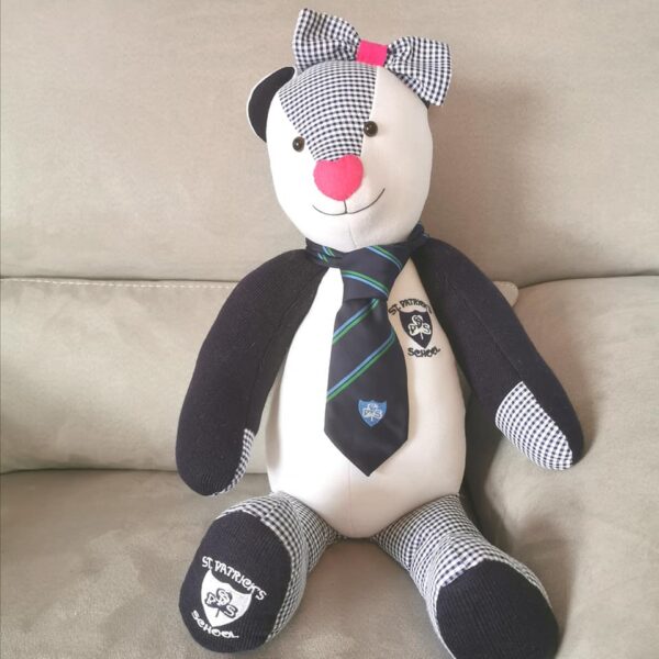 A memory bear sat made from a school uniform