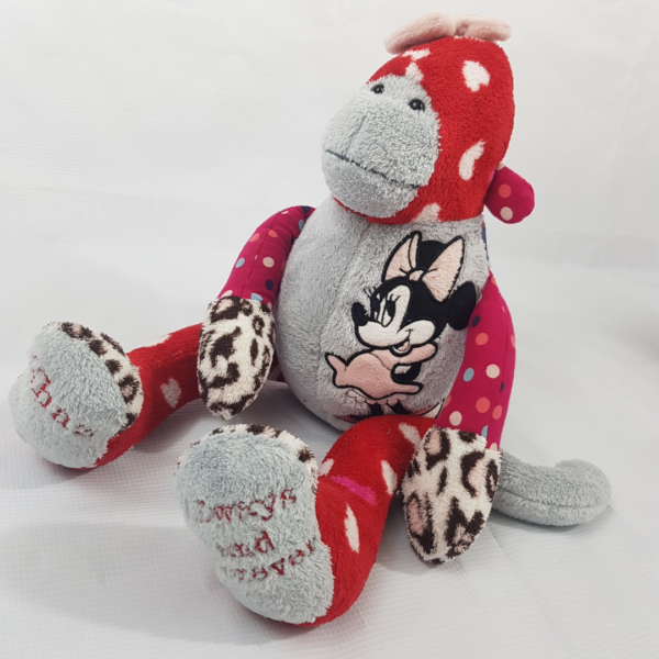 A red and grey keepsake memory monkey with Minnie Mouse on the tummy