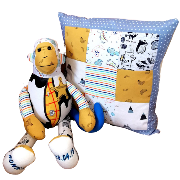 A keepsake memory monkey sat with a memory cushion