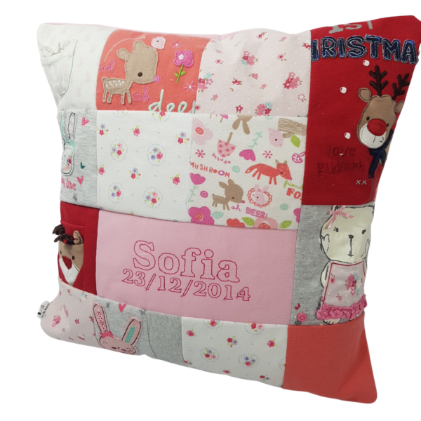 A red, grey and pink memory cushion with 'Sofia 23/12/2014' central to the design