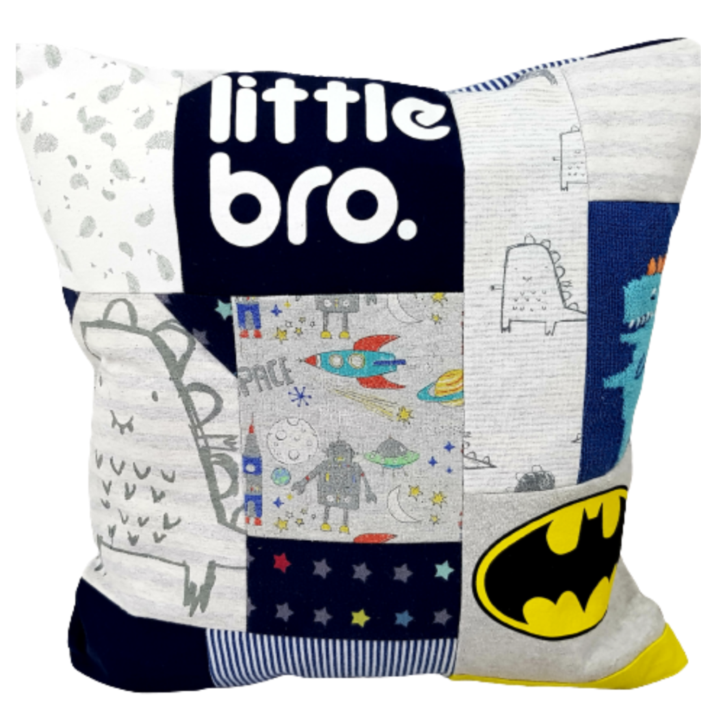 A memory cushion with the words 'little bro' visible