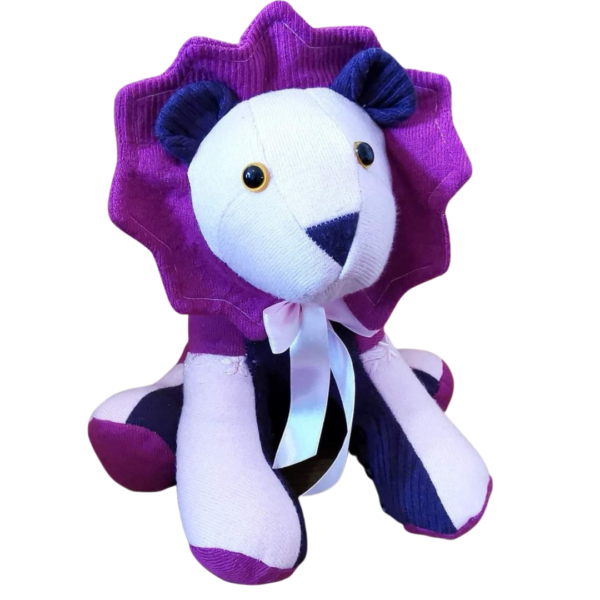 A purple and white keepsake memory lion