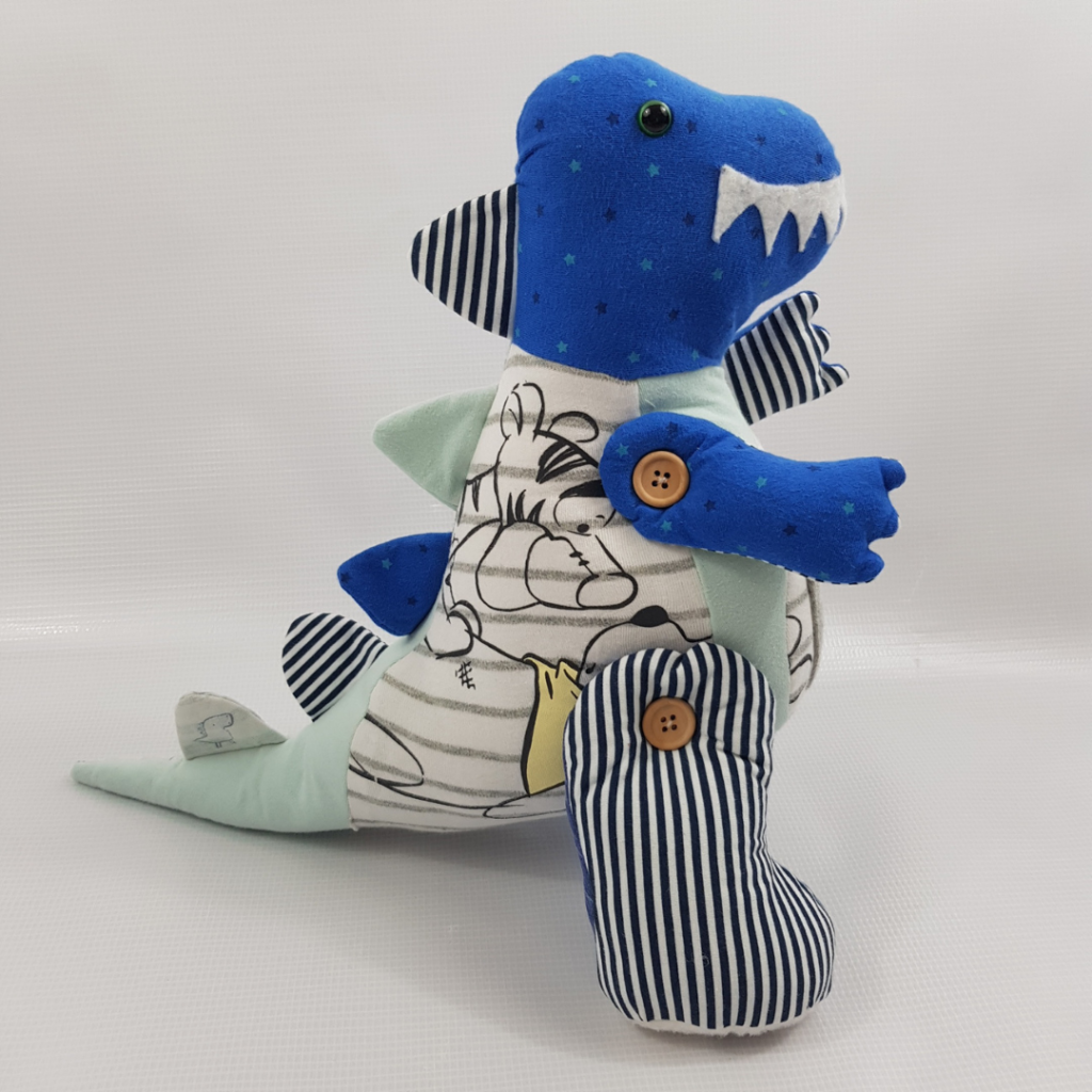 A side view of a blue memory dinosaur