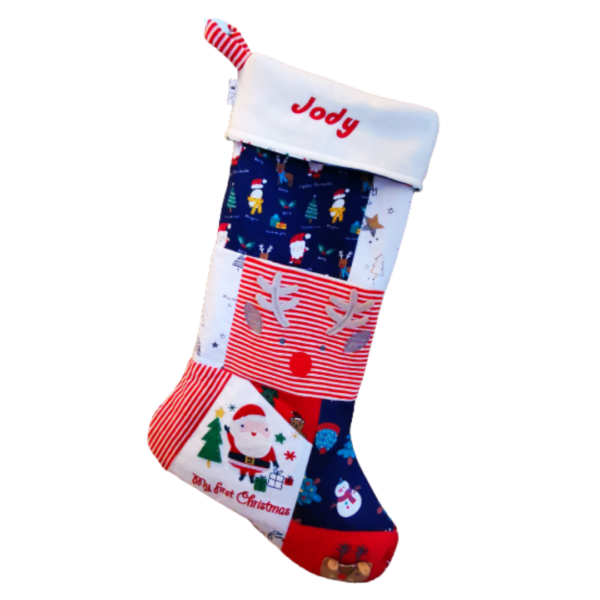 A Christmas stocking with the name 'Jody' at the top