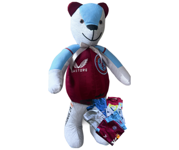 a memory bear made out of football strips