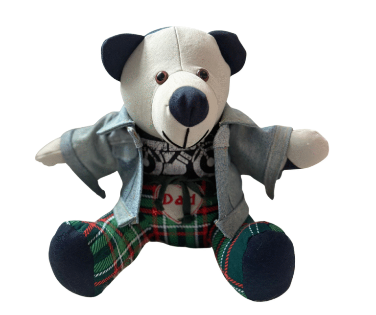 memory bear wearing a mini denim jacket