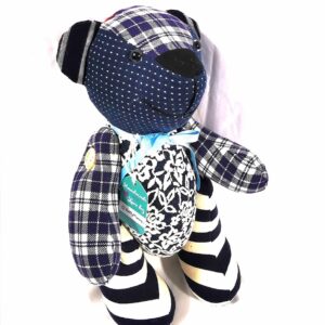 traditional button jointed remembrance bear with movable arms and legs