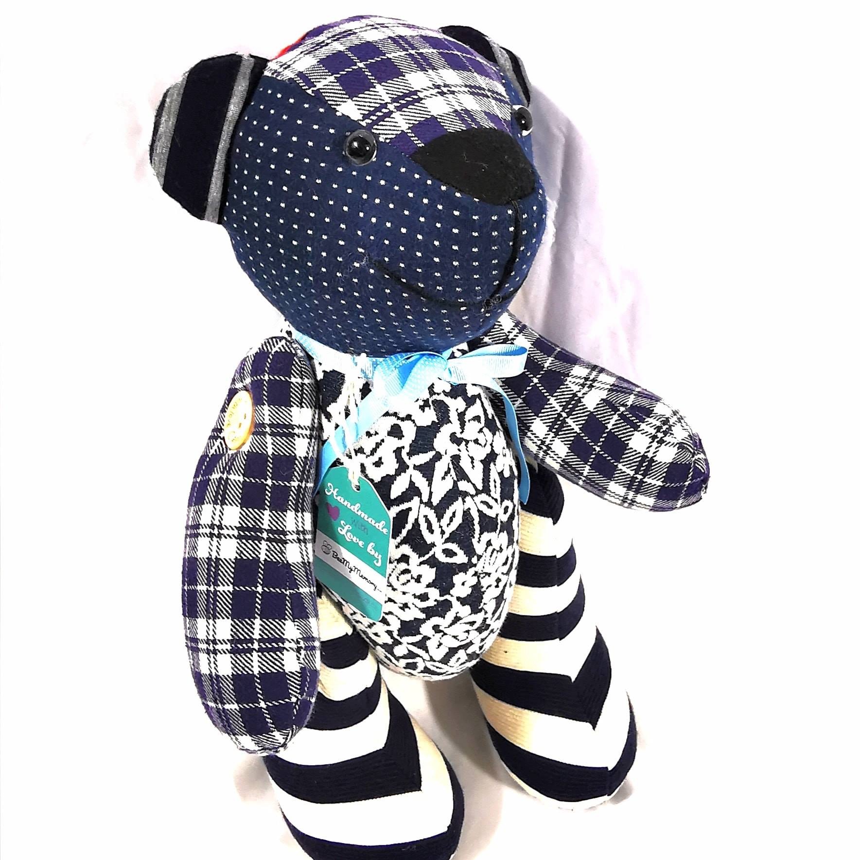 traditional button jointed remembrance bear with movable arms and legs