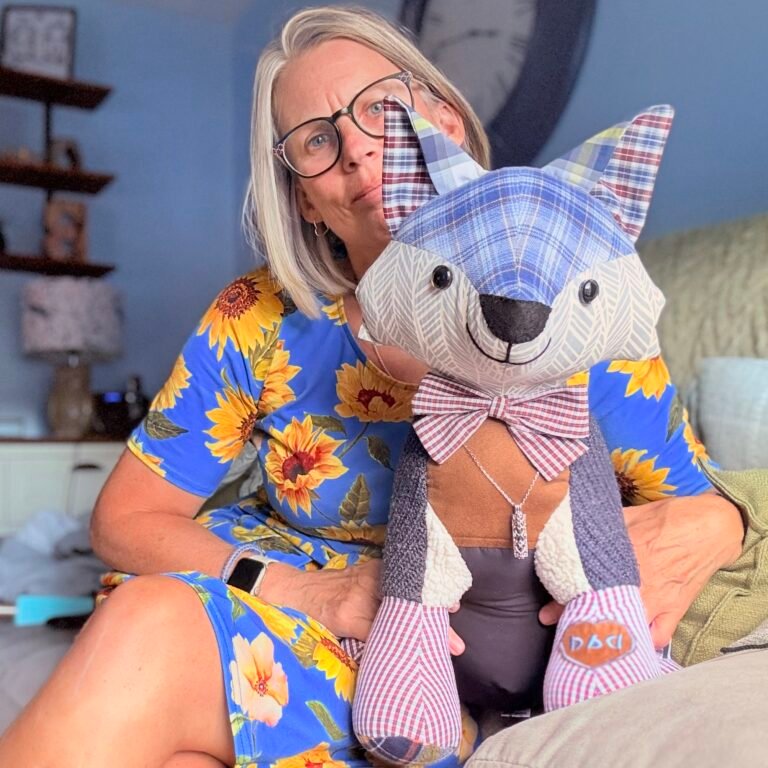authentic memory keepsake maker holding a completed custom memory fox